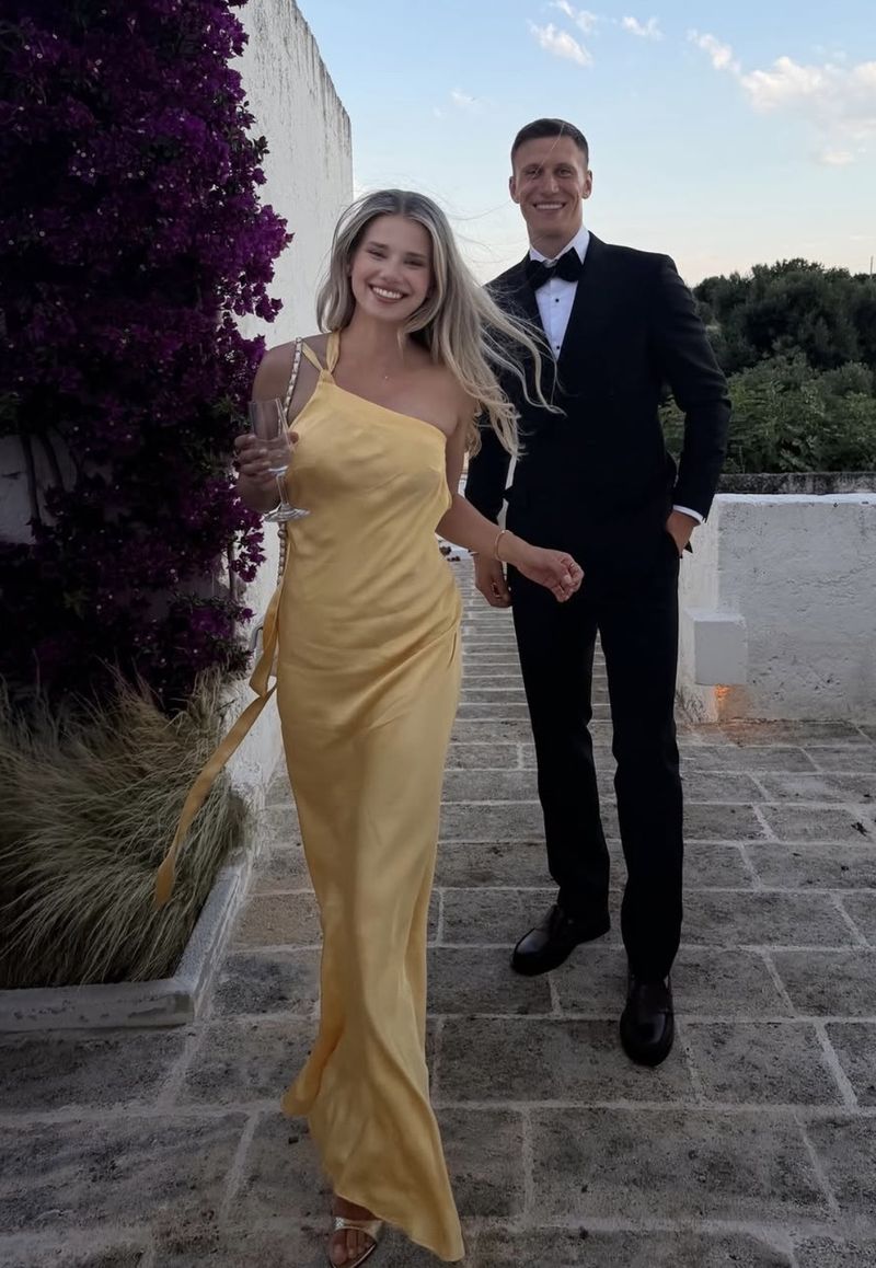 a lemon-yellow silk gown beside a black dinner jacket