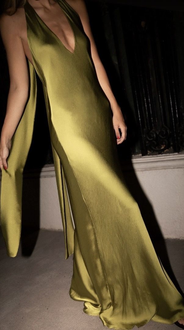 an olive satin gown in evening light