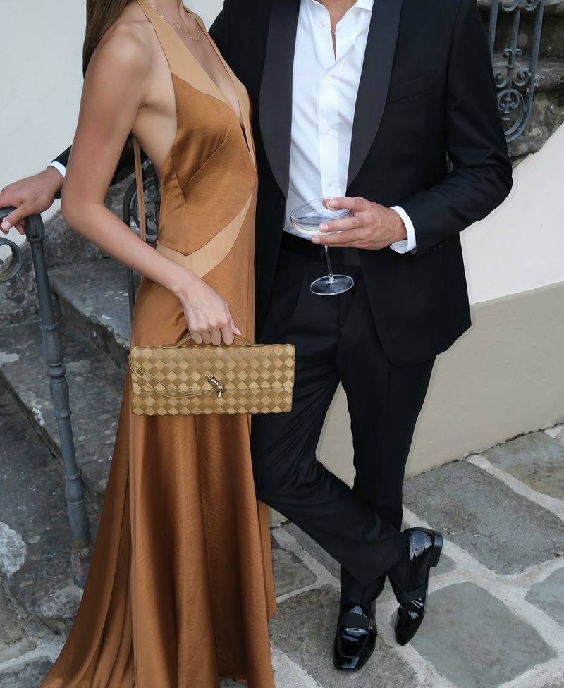a caramel silk gown beside a shawl-lapel dinner jacket